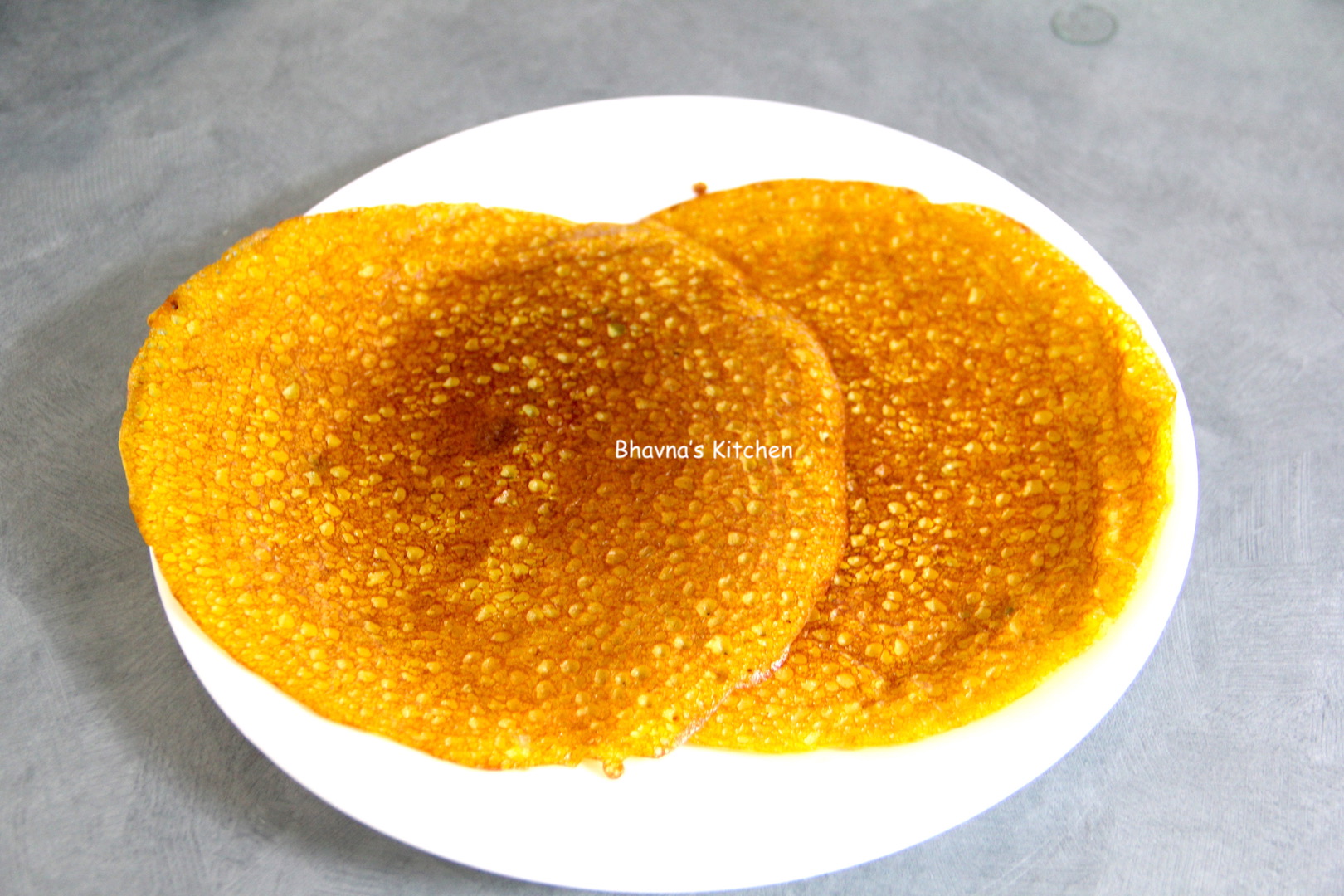 Khatta Puda (Savory Rice Flour Pancakes)